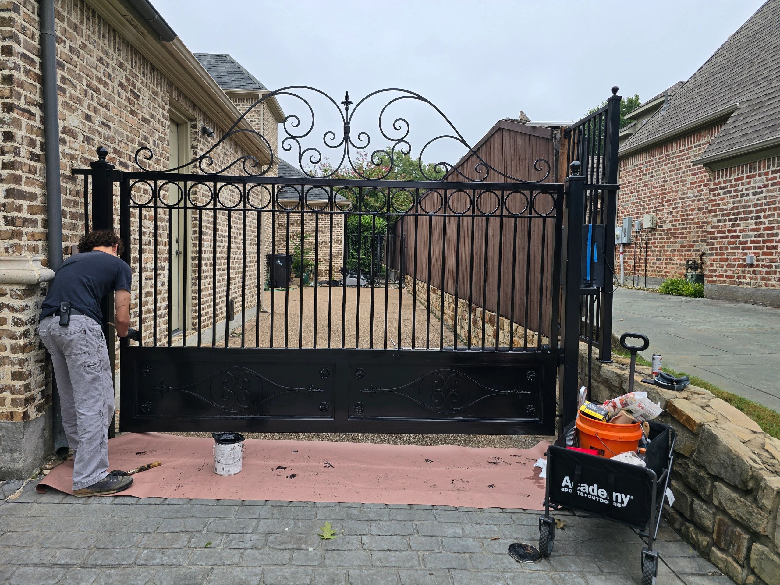 Wrought iron fence gate repair
